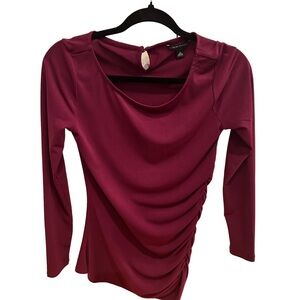 Banana Republic purple polyester spandex longer top. Dress up or down.